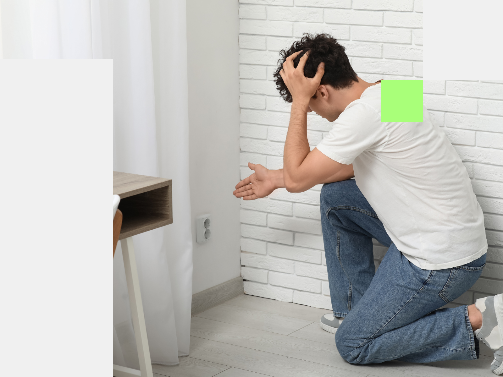 Resident showing signs of stress in a residential property, highlighting the human cost of undetected damp and mould and the legal exposure operators face under Awaab's Law